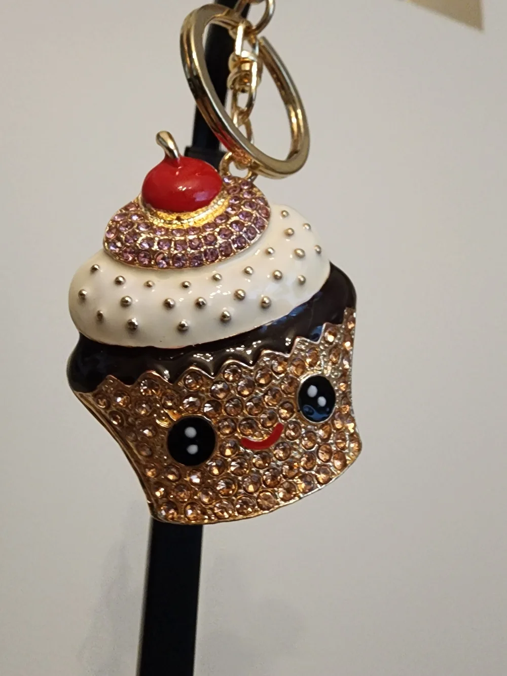 Gold-tone Cupcake Keychain with Pink and White Accents
